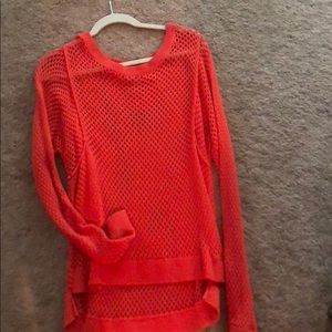 MK orange top